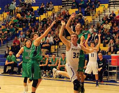 Pirate senior Nate Cox drives to the basket in a home game against Virgin Valley last week. PHOTO BY DAVE BELCHER/Moapa Valley Progress.