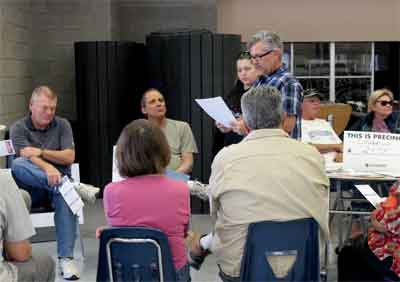 Precinct 2473 Chairman Darren Kelley begins the Democratic caucus meeting for his precinct at the Moapa Valley High School on Saturday. PHOTO BY MAGGIE MCMURRAY/Moapa Valley Progress.