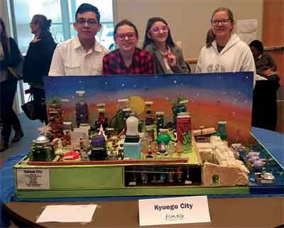 Mack Lyon student Future City presenters l to r Diego Rabines, Kyra Larsen, True Jarrel and Emily Macias show the model of their vision of Kyuego City at the annual competition held on Jan. 23. PHOTO COURTESY OF JACQULYN PRAY.