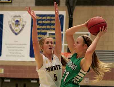 Tensions ran high toward the end of the Pirate girls’ basketball game  against Virgin Valley played on Friday night. Pictured here is Pirate junior Kinlee Marshall (left) defending against Bulldog senior Spencer Green (right).  PHOTO BY LESLIE WHITNEY/Moapa Valley Progress.