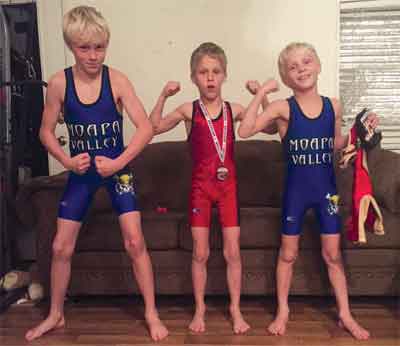 Three Moapa Valley Junior Wrestlers who placed well in last week’s tournament were Chance Houston left, Tyson Houston center (4th place), Stetson Houston right (1st place, champion). 