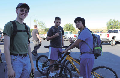 Kalib Hone, Denver Conger, and Connor Waite wait patiently for the trail ride to begin on Friday afternoon. PHOTO BY MAGGIE MCMURRAY/Moapa Valley Progress.