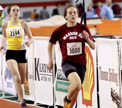 Moapa Valley High School athlete Summer Evans (left) gains on an opponent in the 400 meter race at the Simplot Games in Pocatello, Idaho. PHOTO COURTESY OF SIMPLOT COMPANY.