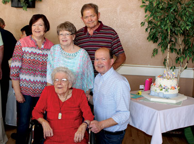 Moapa Valley pioneer Josephine Robison Walsh (seated) celebrated her 100th birthday last week. She is pictured with her four children l to r Wandanell Hopkins, Susannah Merry, Dan Walsh and Jack Walsh. PHOTO BY JESSICA ROBISON/Moapa Valley Progress.