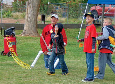 Local Cub Scouts launch card stock rockets they made at the annual Cub Scout Day Camp last weekend at the Overton Park. PHOTO BY STEPHANIE BUNKER/Moapa Valley Progress.