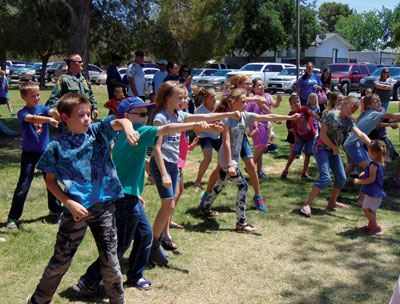 Local children participate in a dance competition during the First Responder Appreciation event held Saturday at Overton Park. PHOTO BY STEPHANIE BUNKER/Moapa Valley Progress.