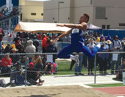 MVHS senior RJ Hubert competes in the long jump at the State Track tournament last week in Carson City. Hubert won a state championship in the event. PHOTO BY DAVE BELCHER/Moapa Valley Progress.