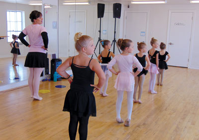 Overton resident Annie Leavitt instructs a class during a special ballet camp held at the Old Overton Gym last week. Leavitt recently attended a teaching conference in New York to bring a better quality of ballet instruction to her classes. PHOTO BY STEPHANIE BUNKER/Moapa Valley Progress.