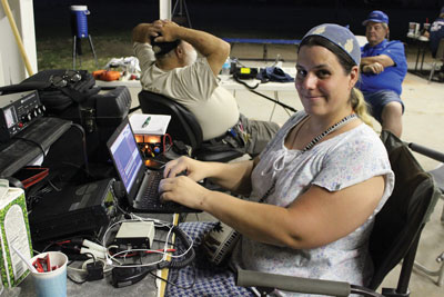 Brigantia Nivatagena uses her laptop computer as a digital radio to communicate during the Amateur Radio Field Day. PHOTO BY BRYNNE MCMURRAY/Moapa Valley Progress.
