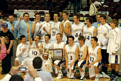 Members of the 2011 MVHS Basketball team celebrates after their final victory against Lowry at the state championships.