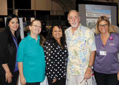 Mesa View Hospital staff welcomed Mesquite mayor Al Litman at the Community Health and Wellness Fair on Friday at the Casablanca Resort. Pictured l to r are Liliana Castaneda, LeAnn Atkin, Doris Baeza, Litman and Kathy Jo Knight. PHOTO BY VERNON ROBISON/Moapa Valley Progress.