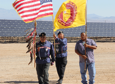 Moapa Paiute veterans l  to r Dalton Tom, Harlan Bow and Greg Anderson perform a flag presentation ceremony at the Moapa Southern Paiute solar project site on Thursday, Sept. 15. PHOTO BY VERNON ROBISON/Moapa Valley Progress.