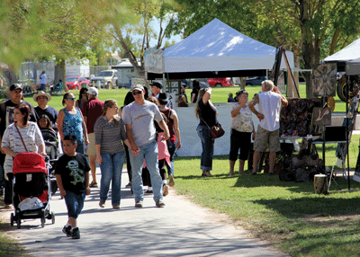 Crowds come out to the Fairgrounds last year to enjoy the Logandale Fall Festival. This year’s festival will be held this Friday through Sunday. 