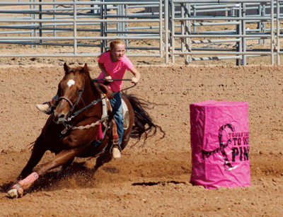 Fallon Yardley competes in barrel racing during the Tough Enough To Wear Pink event held on Saturday at the Clark County Fairgrounds. PHOTO BY MAGGIE MCMURRAY/Moapa Valley Progress.